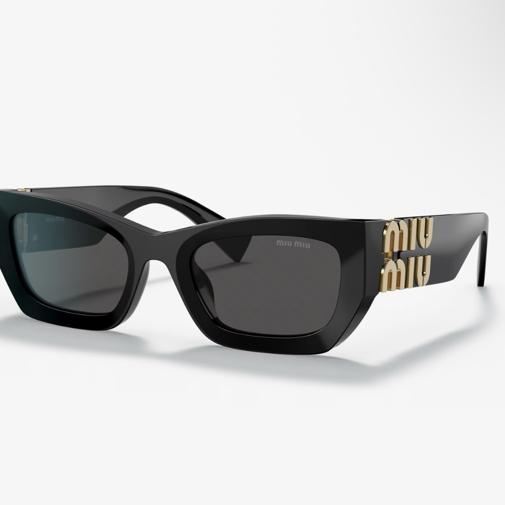 Miu Miu Black and Gold runway sunglasses